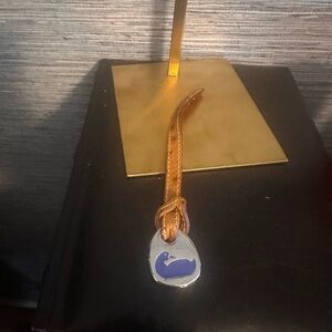 Dooney & Bourke blue duck Silver and Brown Leather hang tag